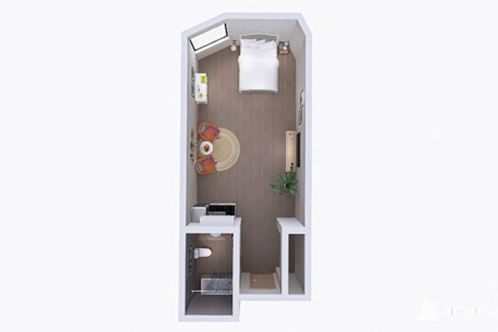 Bedroom image: Private senior living bedroom with comfortable bed and natural lighting